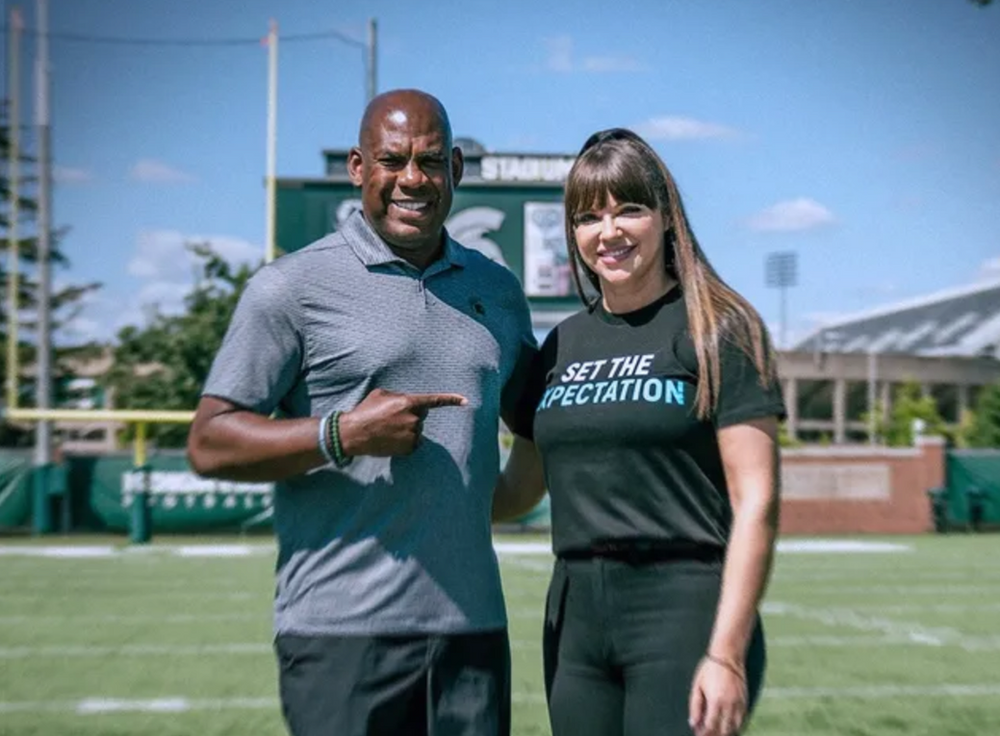 HC Tucker pictured with Tracy during an event at football camp. Photo: MSU Football Twitter